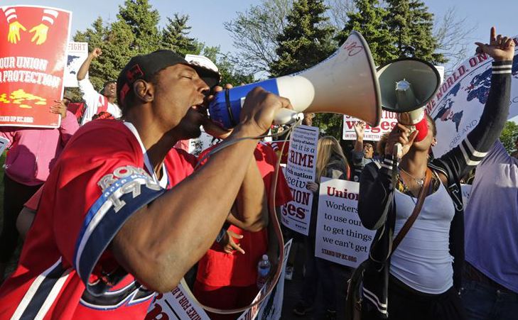 Protesters gather outside  the McDonald’s Corp. shareholders meeting in Oak Brook, Ill., on May 22, demonstrating for higher wages and the right to unionize.