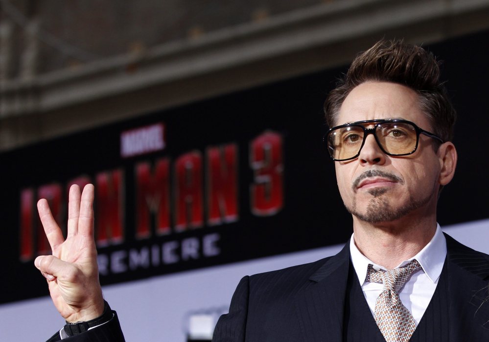 Robert Downey Jr. poses at the premiere of “Iron Man 3” last year. He is the highest-paid actor in Hollywood
Reuters