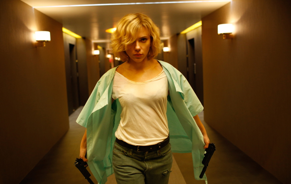 Scarlett Johansson plays an avenging drug mule in “Lucy,” which sold $44 million worth of tickets on its first weekend.