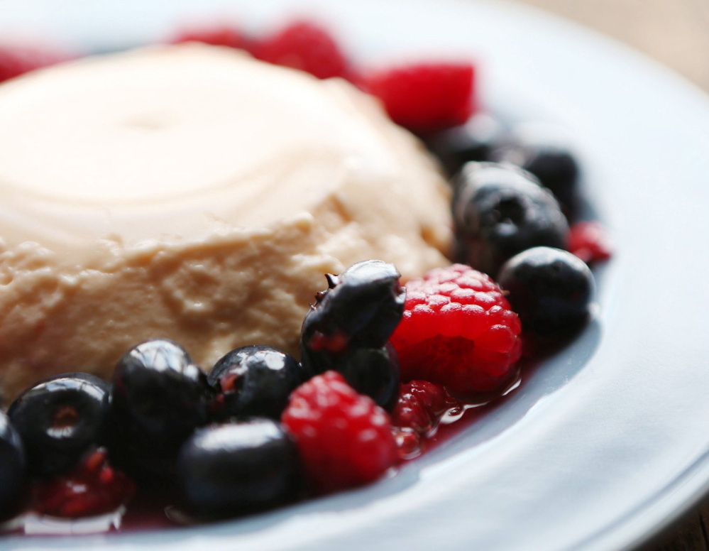 Creamy Cantaloupe Panna Cotta with Mixed Berries.