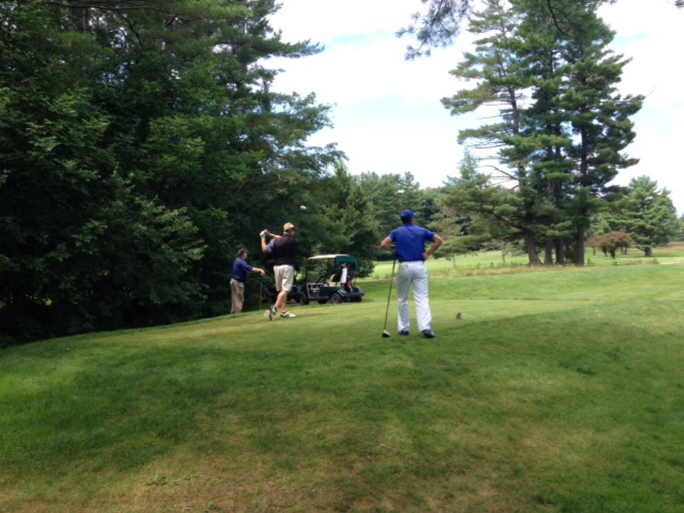 Eric Egloff tees off during the annual Charlie's Maine Open on Tuesday morning. Staff photo by Evan Crawley