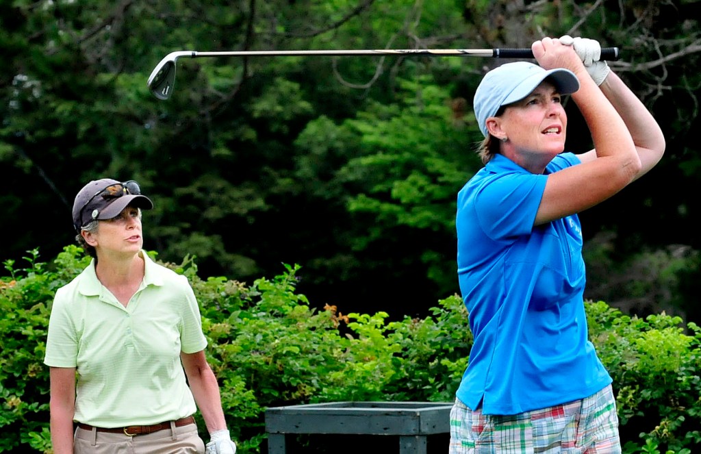 Leslie Guenther, right, had a tough day Wednesday after a strong day Tuesday but in the end came away with the Maine Women’s Amateur championship at the Waterville Country Club. Mary Brandes, left, finished second. David Leaming/Staff Photographer