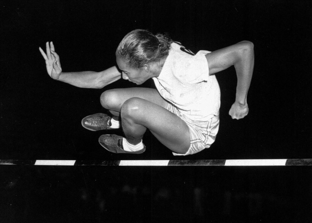 Alice Coachman of Albany, Ga., clears the bar to win the running high jump in the Women’s National Track Meet in 1948 in Grand Rapids, Iowa. She is credited with helping inspire the careers of Olympians including Jackie Joyner-Kersee and Florence Griffith Joyner. File Photo/The Associated Press