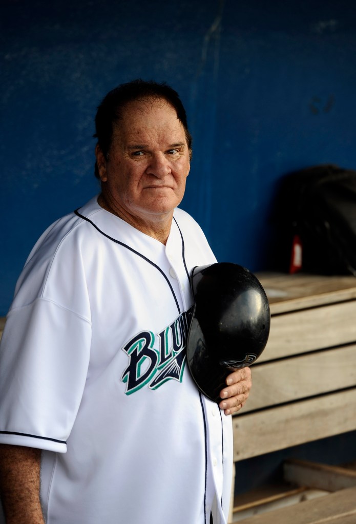 Pete Rose stands for the national anthem during a game on June 16 in Bridgeport, Connecticut. Rose, banned from Major League Baseball, managed the independent Bridgeport Bluefish for a day. Commissioner Bud Selig now says Rose could play a part in the ceremonies when the Cincinnati Reds host the 2015 All-Star game.