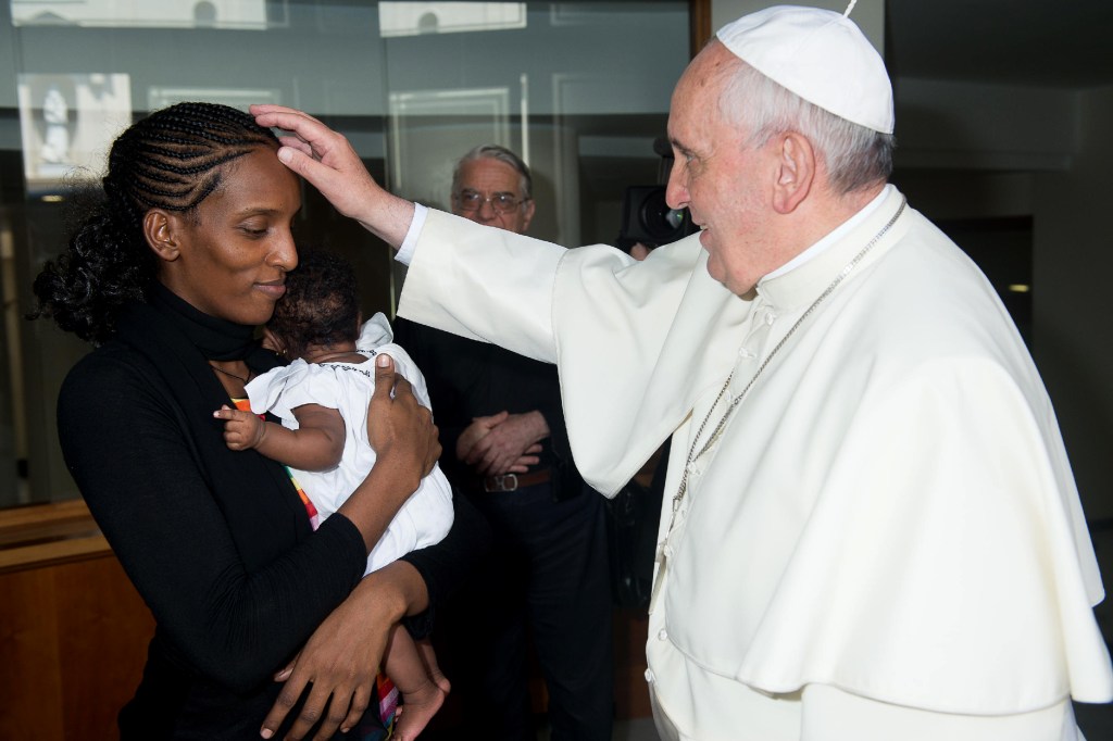 Pope Francis meets Meriam Ibrahim, from Sudan, with her daughter, Maya, in her arms, in his Santa Marta residence at the Vatican on Thursday.
The Associated Press