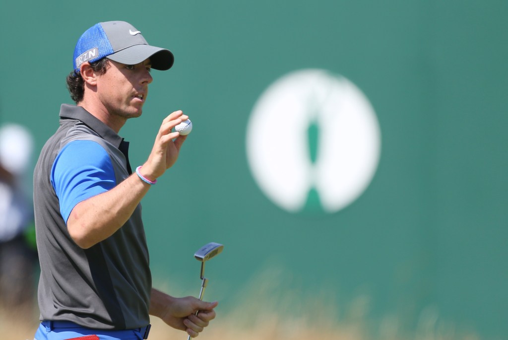 Rory McIlroy finishes his first round in the British Open on Thursday with a 6-under-par 66, good for the lead in the tournament at the Royal Liverpool golf club.