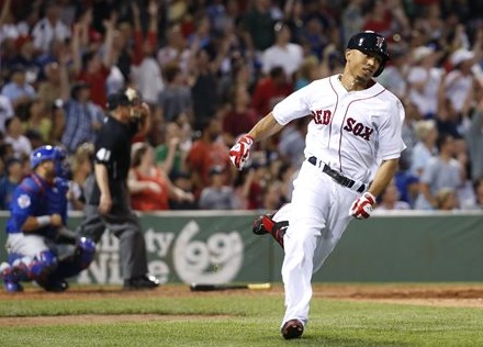 Red Sox center fielder Mookie Betts runs after hitting a two-run home run against the Chicago Cubs at Fenway Park in Boston on July 3. The Associated Press