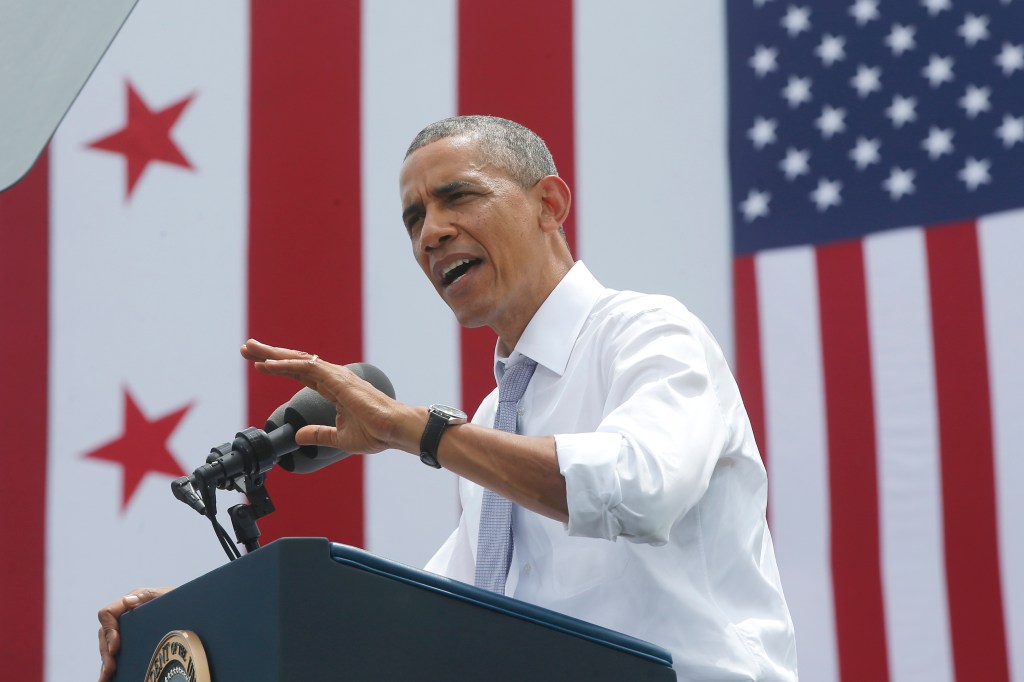 President Barack Obama speaks about transportation and the economy, Tuesday, July 1, 2014, at the Georgetown Waterfront Park in Washington. The president said 700,000 jobs could be at risk next year if Congress doesn't quickly agree on how to pay for highway and transit programs. 