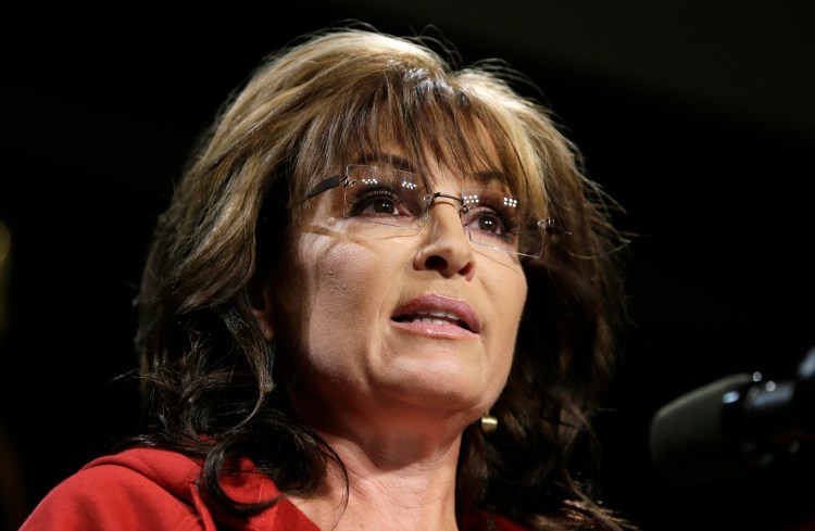Former Alaska Gov. Sarah Palin speaks during a campaign rally in West Des Moines, Iowa., in this April 27, 2014, photo. Palin says she oversees all content posted to her new channel, which debuted Sunday.  The Associated Press