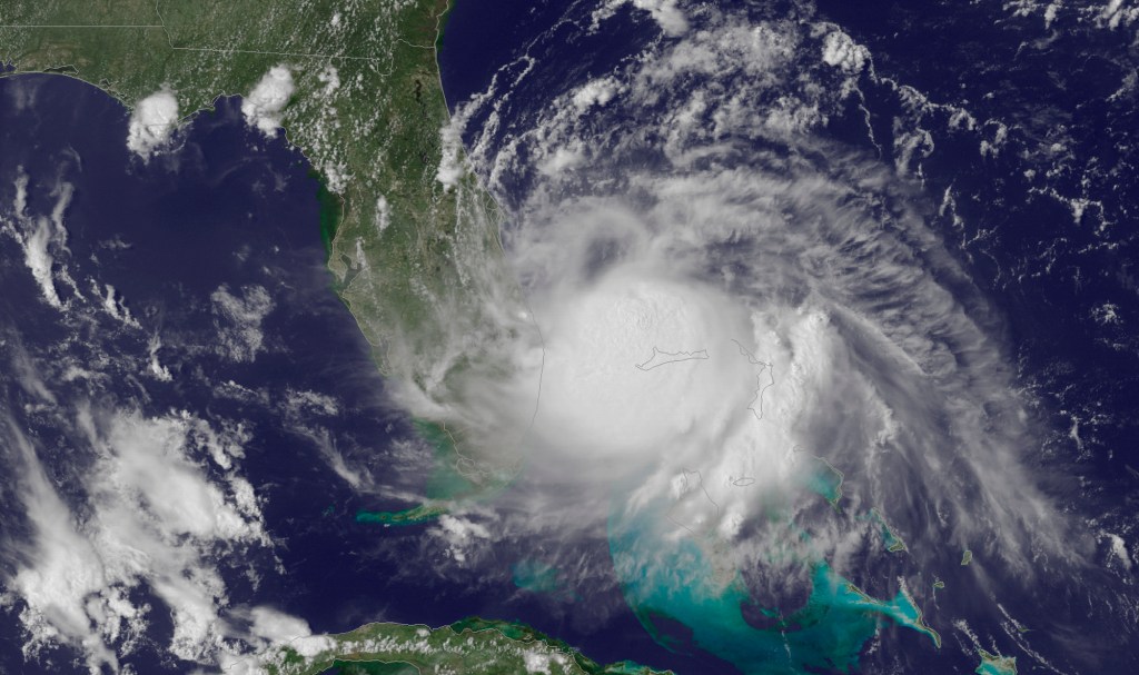 This Tuesday, July 1, 2014, satellite image released by the National Oceanic and Atmospheric Administration (NOAA), shows the center of Tropical Storm Arthur off the east coast of Florida.
