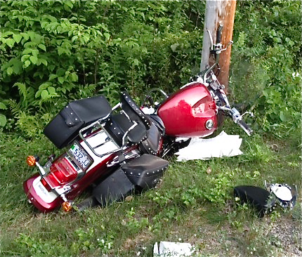 This photo provided by the York County Sheriff's Office shows the crash scene in Arundel where a 2008 Suzuki motorcycle operated by Shawn Biggar hit a utliity pole Wednesday evening. 

