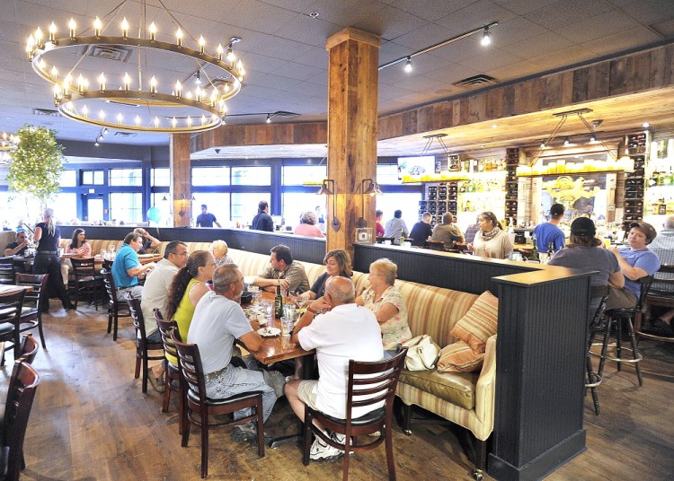 Tuscan Brick Oven Bistro in Freeport offers a cool, wide-open space with comfortable banquette seating.