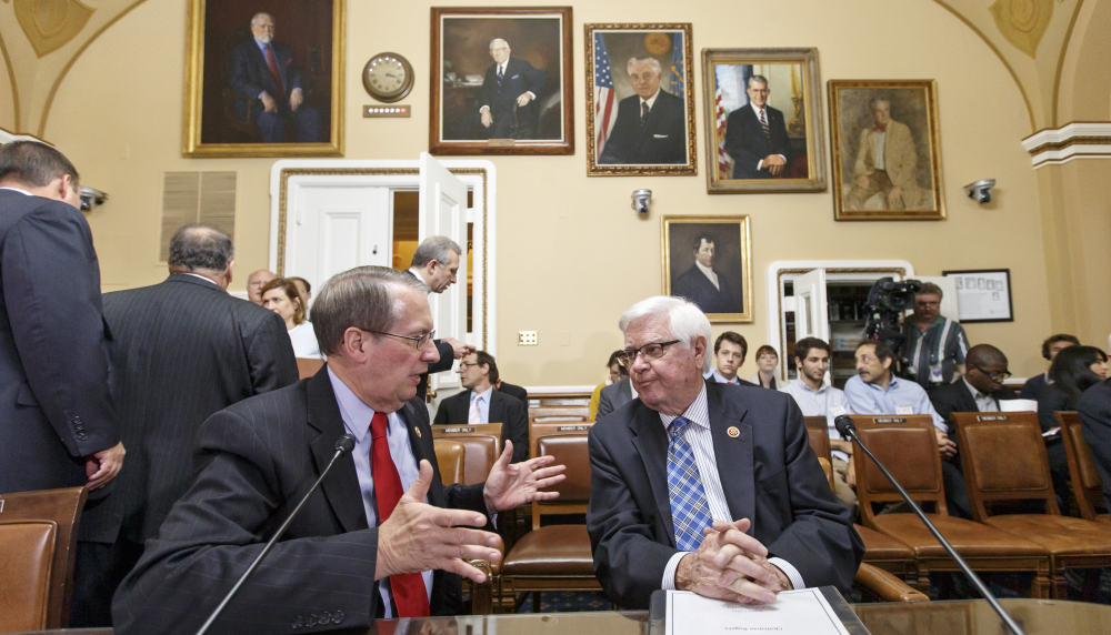 House Judiciary Committee Chairman Rep. Bob Goodlatte, R-Va., left, confers with Appropriations Committee Chairman Rep. Hal Rogers, R-Ky., on Friday as the House Rules Committee meets to take the steps to bring new proposals to the floor to deal with the influx of migrant children at the U.S.-Mexico border.