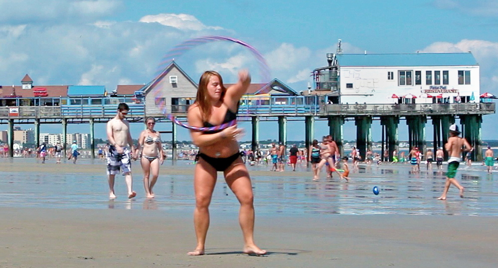 Nicole Raulukaitis practices dancing with a hoop. The Pier has stood as an iconic image of the town for more than 100 years.
Amelia Kunhardt/Staff Photographer
