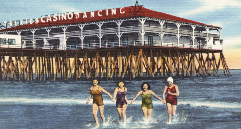 A historic postcard shows The Pier at Old Orchard Beach in the mid-20th century. 