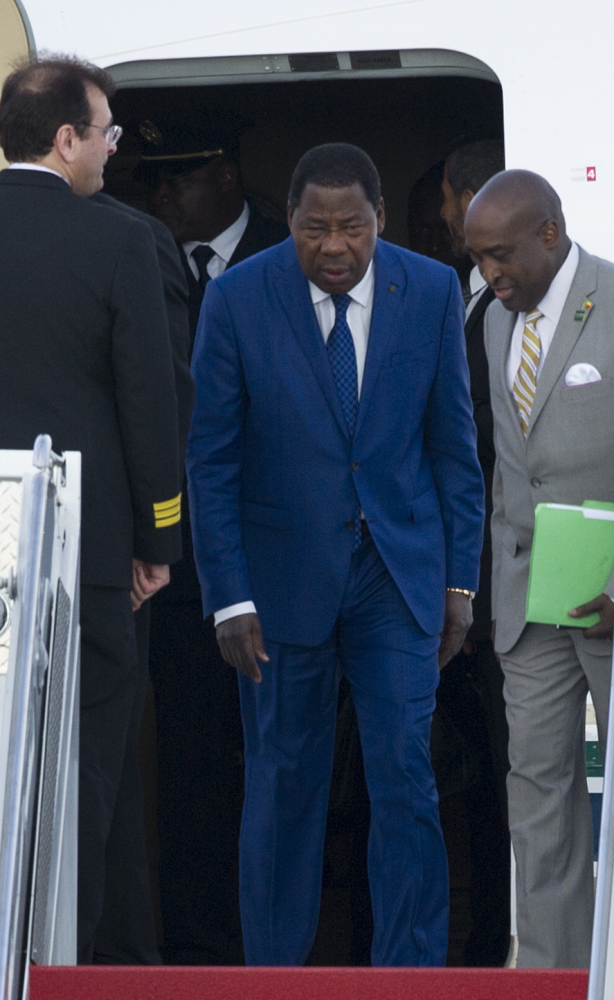 Yayi Boni, center, president of the West African nation of Benin, arrives Sunday at Andrews Air Force Base in Maryland for the U.S.-African Leaders Summit, a three-day event that begins Monday.
