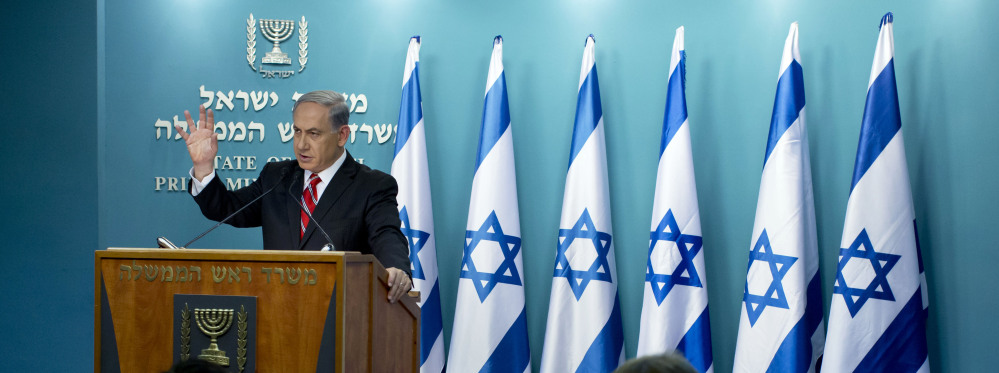 Israeli Prime Minister Benjamin Netanyahu speaks at a news conference in Jerusalem on Wednesday. He defended Israel’s intense bombardment of Gaza, saying that despite the high civilian death toll it was a “justified” and “proportionate” response to Hamas attacks.