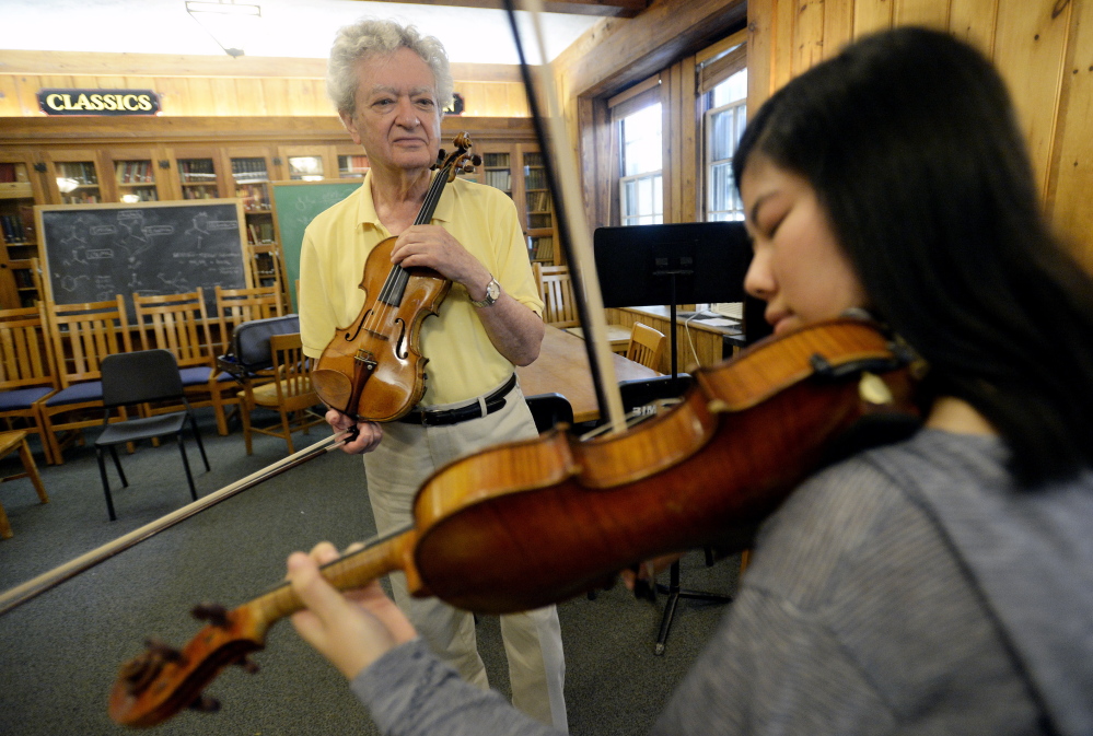 Lewis Kaplan watches Muyun Tang of China as she plays the violin during a lesson at Bowdoin College.

Shawn Patrick Ouellette/Staff Photographer