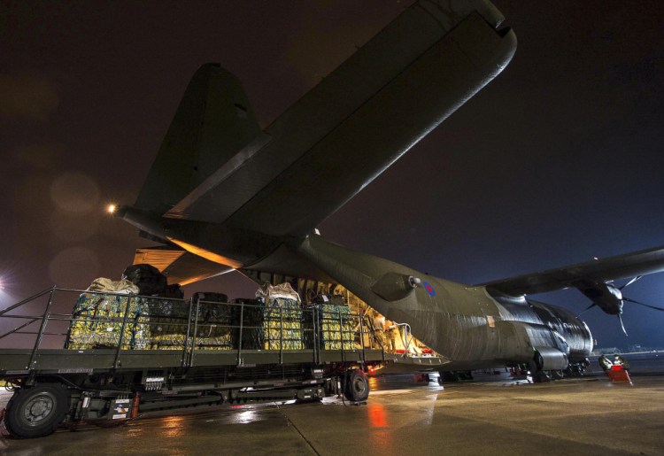 In this British Ministry of Defence image taken Friday Aug., humanitarian aid being loaded onto a RAF Hercules C130 at RAF Brize Norton, England en-route for Iraq, as the West tries to counter the threat from Islamic State (IS) extremists in the troubled country.