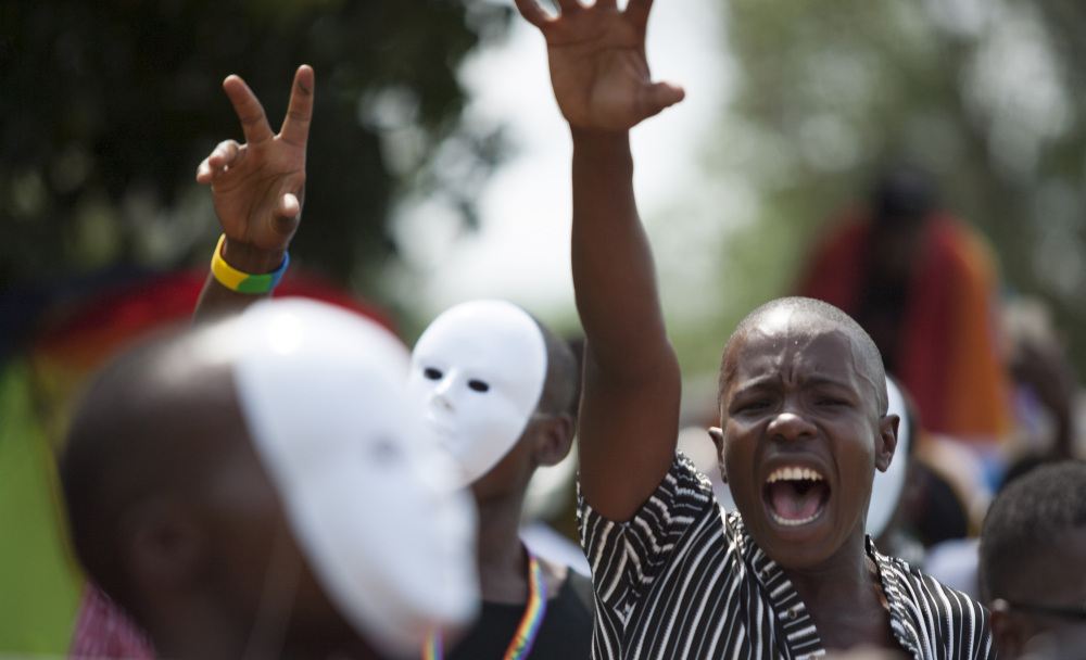 Ugandans march in the third annual Lesbian, Gay, Bisexual and Transgender Pride parade in Entebbe, Uganda, on Saturday.