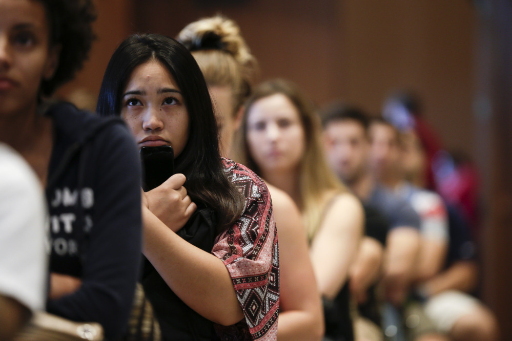 New students at San Diego State University watch a video on sexual consent during a recent orientation meeting. California legislation would require schools that receive public funds for student financial assistance to set a so-called “affirmative consent standard.”