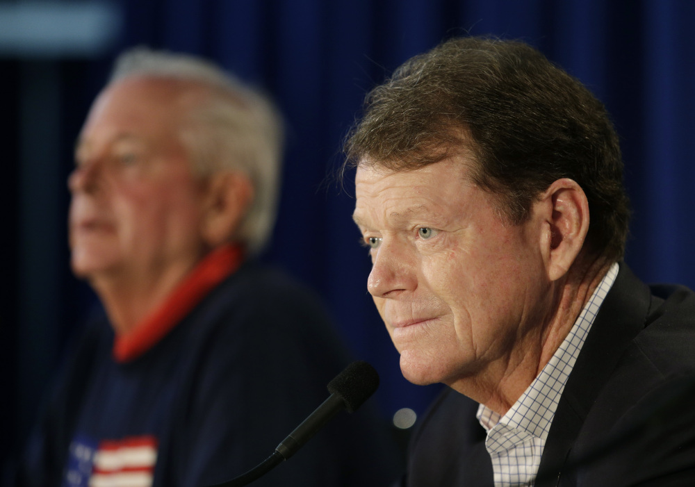 United States Ryder Cup Captain Tom Watson, right, speaks at a news conference at Valhalla Golf Club Monday, in Louisville, Ky.