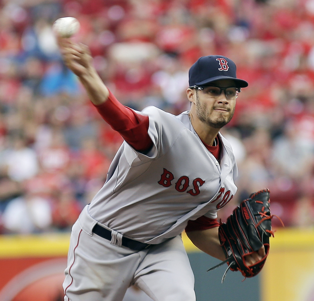 Red Sox pitcher Joe Kelly throws in the first inning Tuesday night against the Cincinnati Reds. After a shaky start, Kelly finished allowing just five hits and two runs in six innings.
