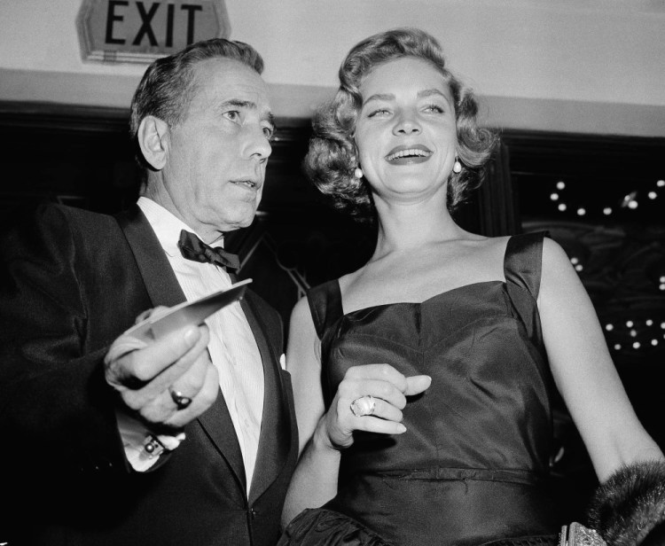 Lauren Bacall attends the Oct. 12, 1955, premiere of “The Desperate Hours” in Los Angeles with her husband, Humphrey Bogart. 