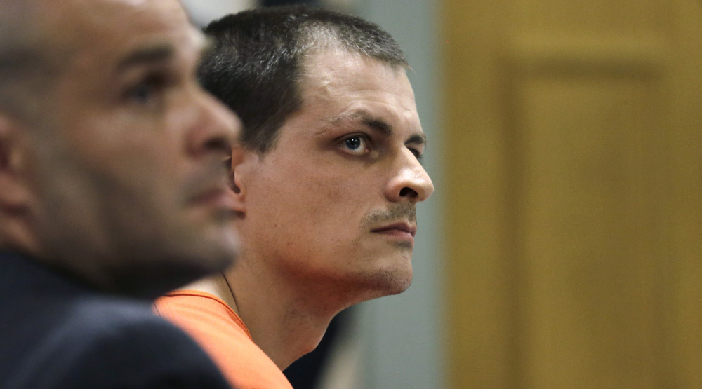 Nathaniel Kibby of Gorham, N.H., listens during his arraignment in Conway District Court in Conway, N.H., on July 29. Kibby is charged with kidnapping Abigail Hernandez, 14, nine months ago.