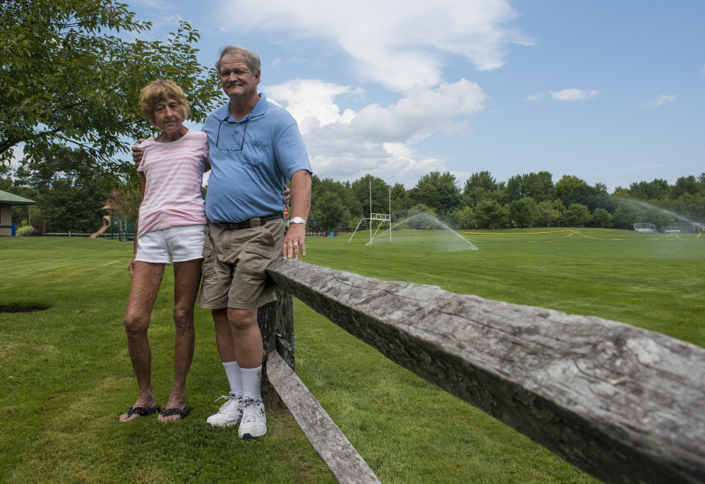 Wayne and Karen Tanguay, shown at Willey Field in Scarborough last week, are among Scarborough residents who believe the presence of cell towers would drive property values down.