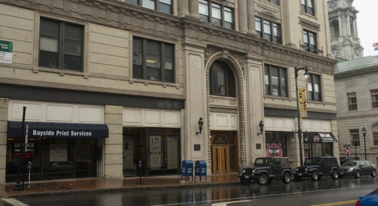 The front half of the Masonic Temple on Congress Street in Portland, with nearly 50,000 square feet of commercial office and retail space, will be auctioned off in September. The back half of the building is not for sale.