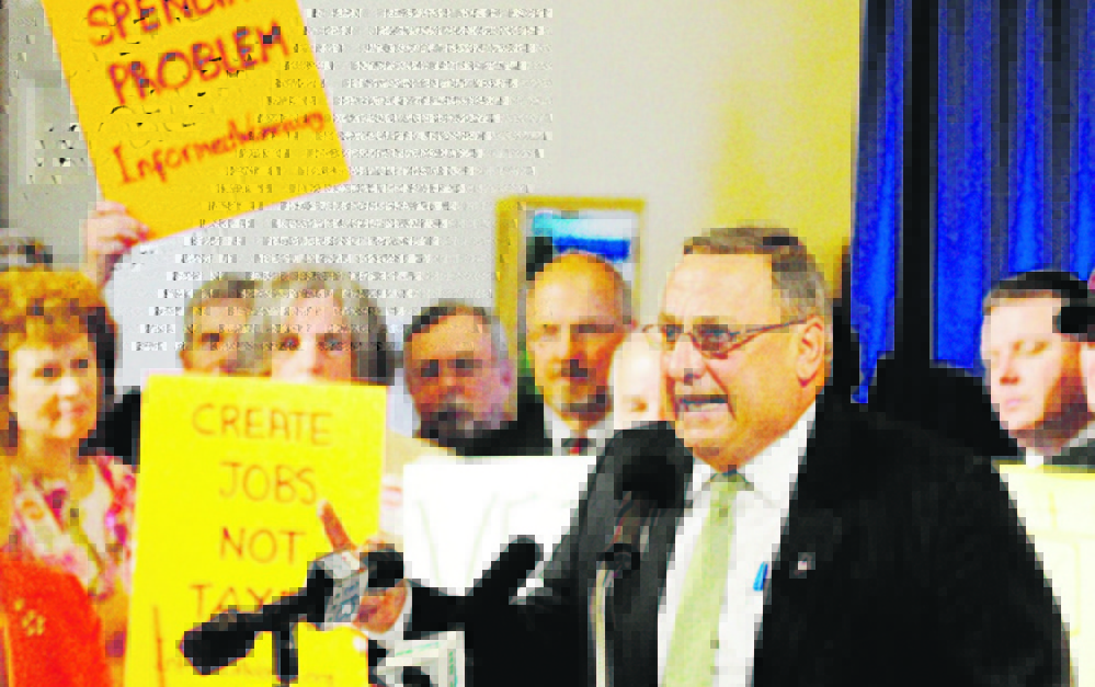 Gov. Paul LePage speaks during a rally last year in the Hall of Flags at the State House in Augusta.