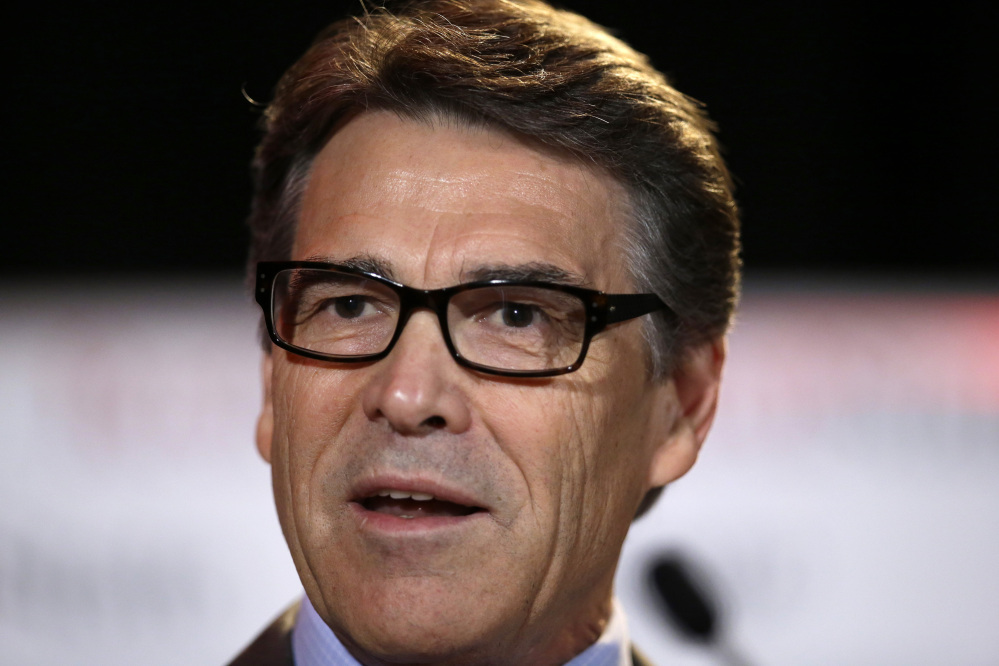 Texas Gov. Rick Perry was indicted on a charge of abusing his power after carrying out a threat to veto funding for state public corruption prosecutors.