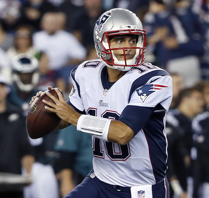 Rookie quarterback Jimmy Garoppolo looks for a receiver Friday night during the Patriots’ 42-35 preseason victory against the Philadelphia Eagles at Gillette Stadium. Garoppolo threw two touchdown passes in the first half as he continued his battle with Ryan Mallett for the No. 2 quarterback job.