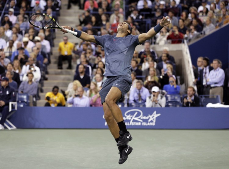  Rafael Nadal of Spain reacts after defeating Novak Djokovic, of Serbia, during the men’s singles final of the 2013 U.S. Open.