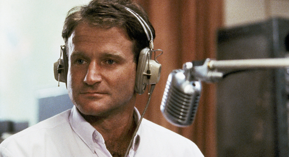 Robin Williams is shown in character as real-life disc jockey Adrian Cronauer in “Good Morning, Vietnam.” He made us look at ourselves in ways that challenged and shocked us.