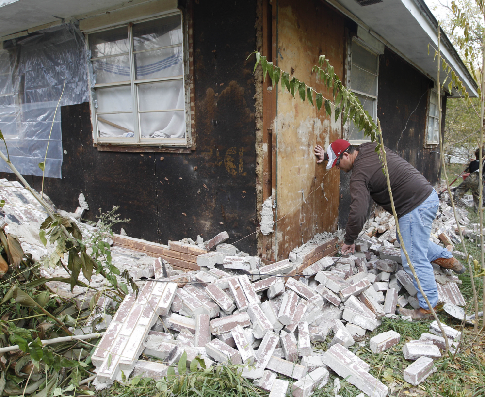 Damage in Sparks, Okla., in 2011 was widespread after two earthquakes struck in less than 24 hours. Man-made quakes are weaker than natural quakes of the same magnitude.