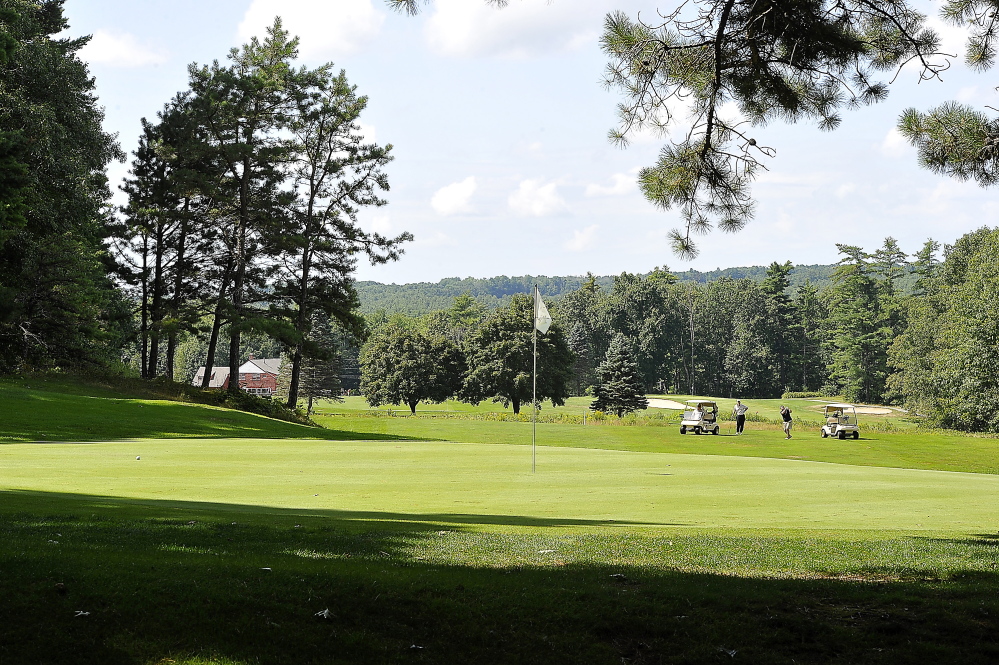 Golfers hit their approach on the 11th hole at the Sanford Country Club recently. Baseball Hall of Famer Ted Williams would play a round from time to time at Sanford, which expanded from nine to 18 holes in 1996. Ricky Jones won the Maine Amateur there in 2004.