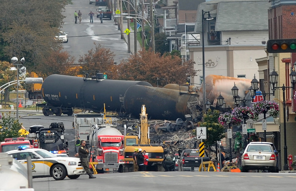Crude oil tankers from the Montreal, Maine & Atlantic Railways are seen in the heart of downtown Lac-Megantic, Quebec, where the runaway train exploded on July 9, 2013.