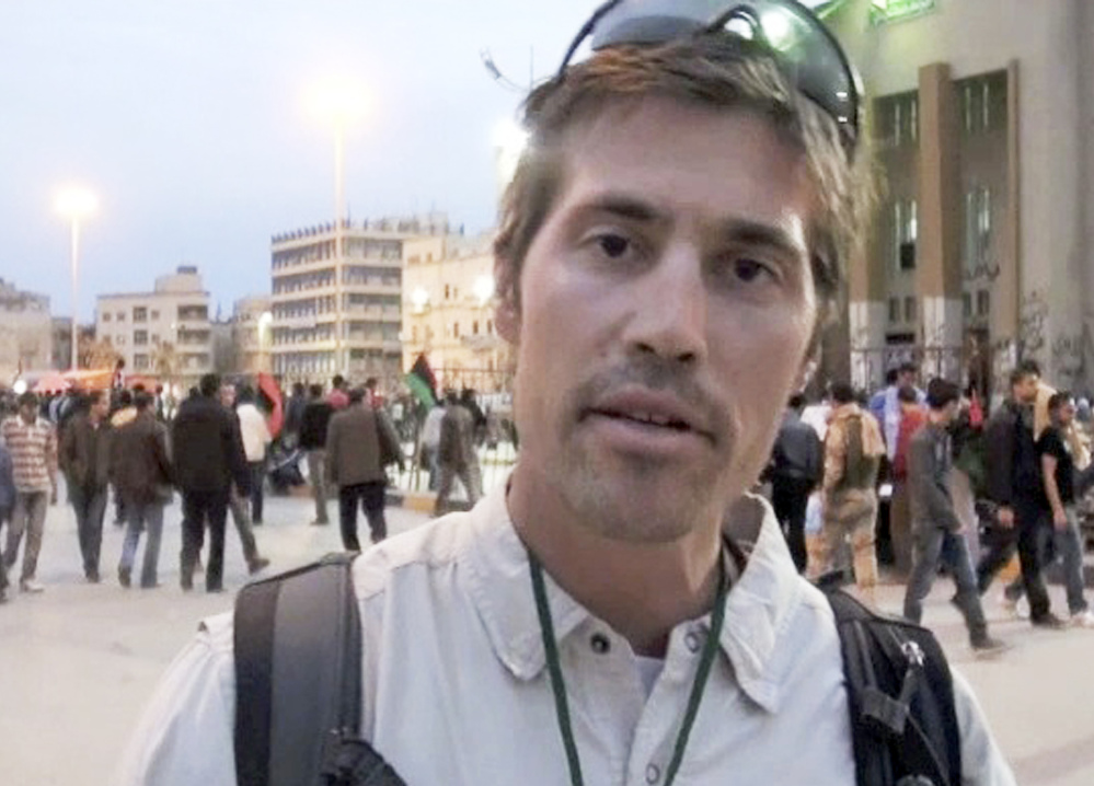 Photojournalist James Foley of Rochester, N.H., is shown in Benghazi, Libya, in 2011. He was executed by Islamic militants in a horrifying act of revenge for U.S. airstrikes in northern Iraq.