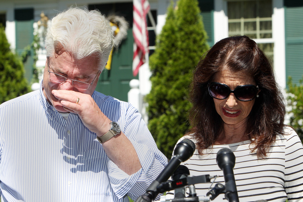 The Associated Press
John and Diane Foley talk to reporters after speaking with President Obama on Wednesday outside their home in Rochester, N.H. Their son, James Foley was abducted in November 2012 while covering the Syrian conflict and executed by Islamic extremists. Diane Foley called him “an extraordinary son, journalist and person.”
