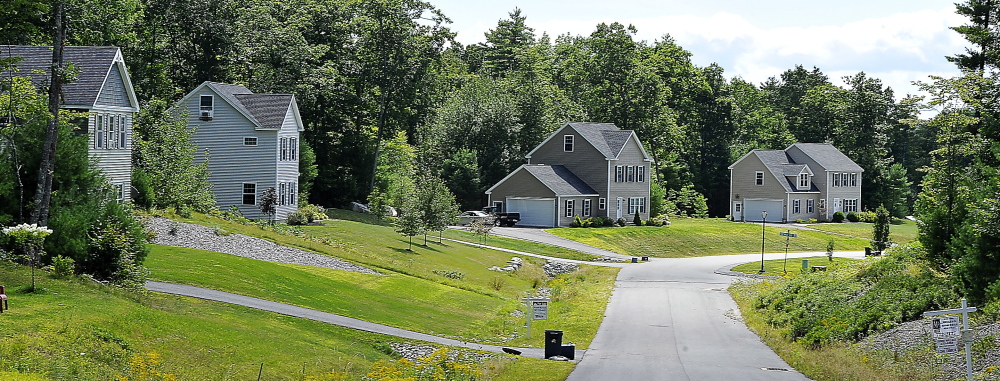Homes stand on winding Thrush Terrace in Windham. Buyers can get more house for their money here than in nearby towns and the demand for larger houses is growing.