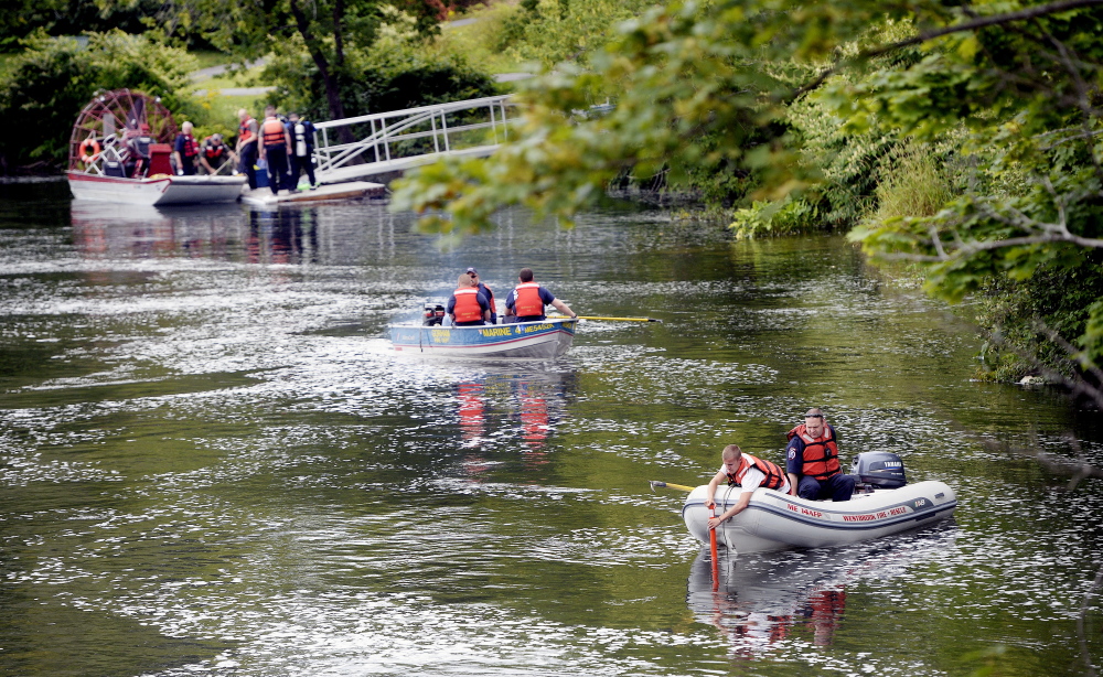 Rescue workers from about 10 agencies search the Presumpscot River in Westbrook on Thursday morning for a man believed to be in the river.
