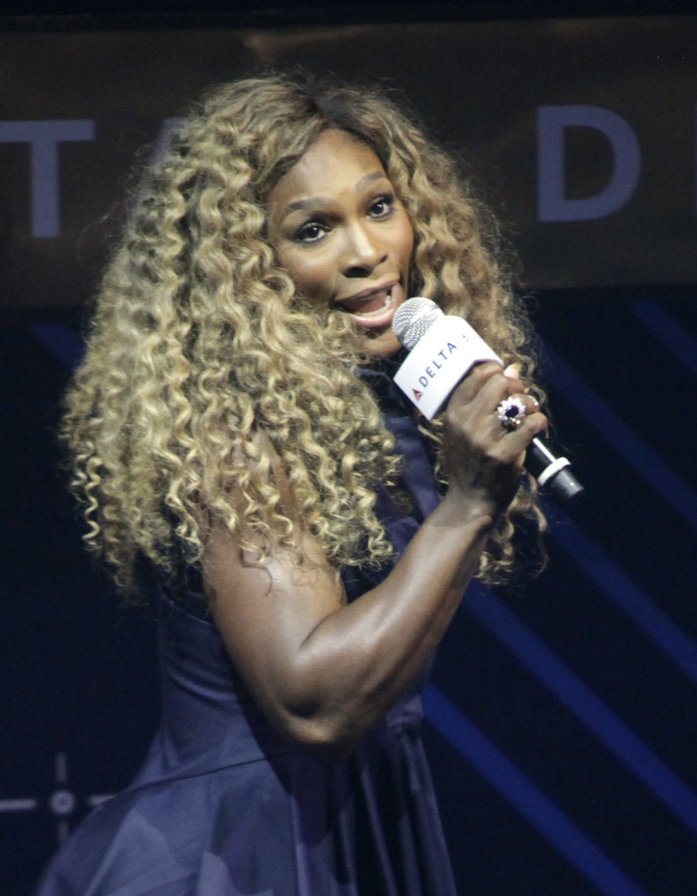 Tennis player Serena Williams performs karaoke on stage in New York.
