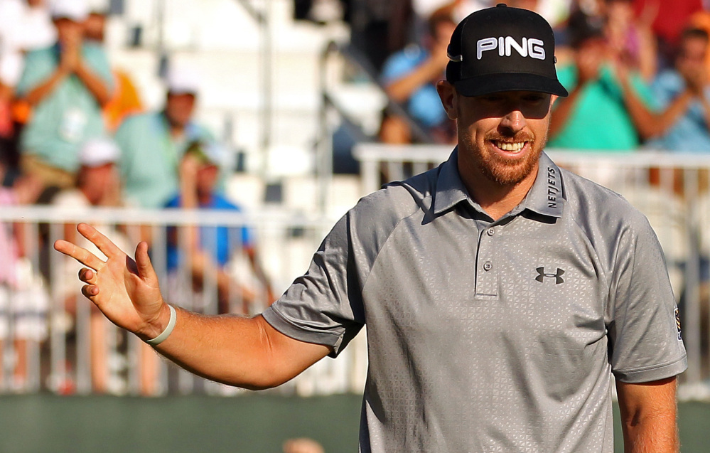 Hunter Mahan celebrates after putting on the 18th green on his way to victory at The Barclays on Sunday in Paramus, New Jersey. Mahan shot 6-under par Sunday to win for the first time in 49 events.