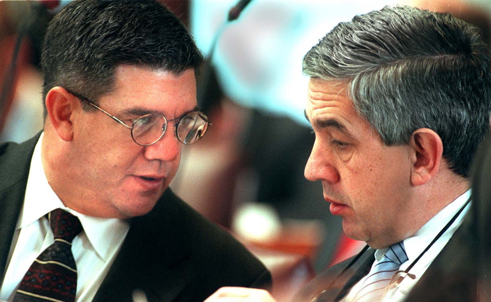 Chris and Kevin Muse confer in House chambers  in 2001.
Press Herald file photo