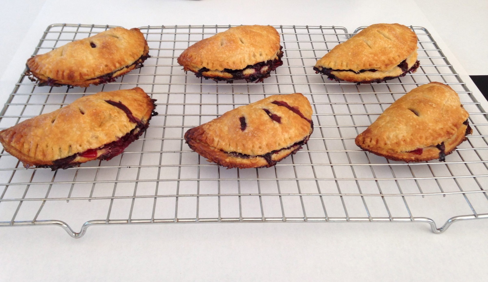 Easy to serve and eat, berry hand pies are practical desserts for a beach picnic.