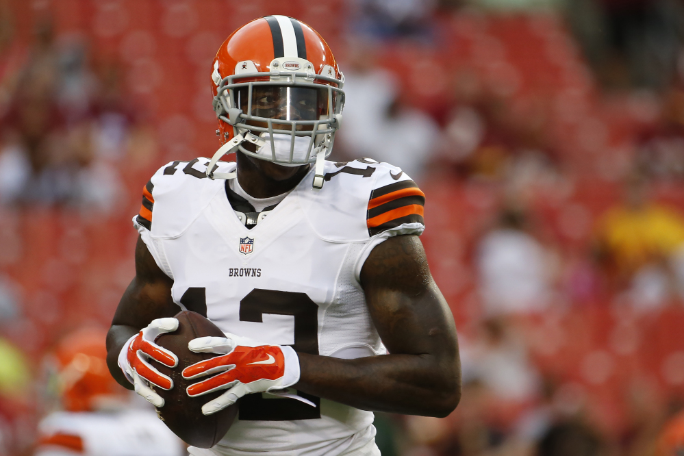 Cleveland Browns wide receiver Josh Gordon, seen warming up for a preseason game Aug. 18, has been suspended by the NFL for using marijuana, in violation of the league’s substance abuse policy.