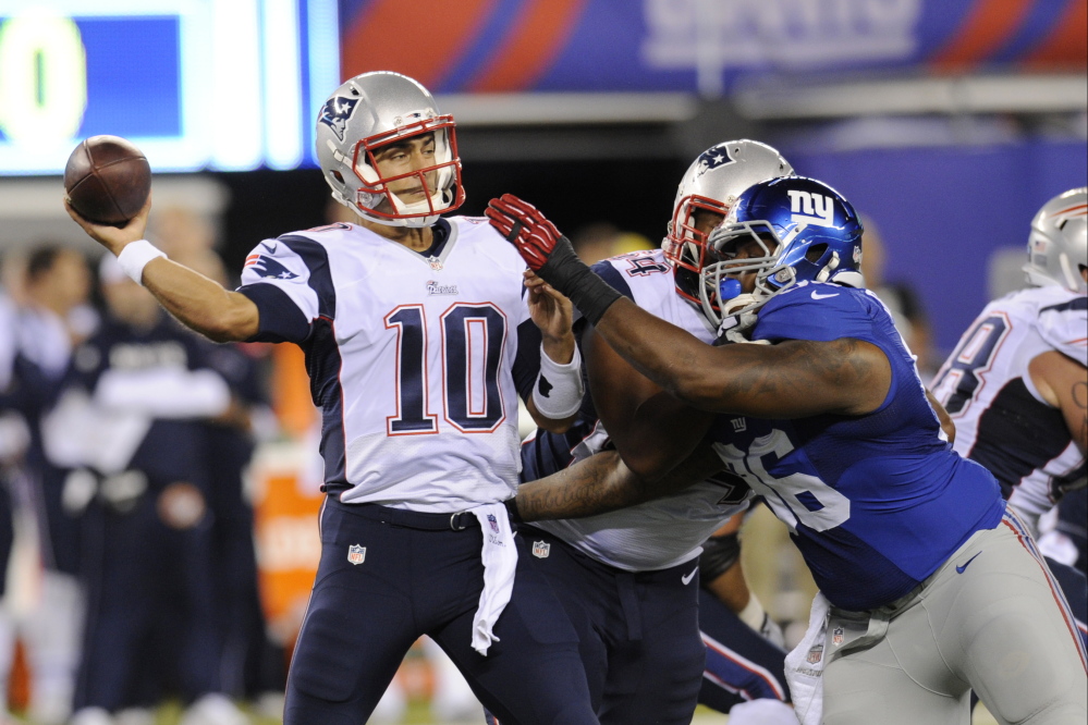 New England Patriots quarterback Jimmy Garoppolo throws during the first half of Thursday night’s game against the New York Giants. The Giants won to finish unbeaten in the preseason.