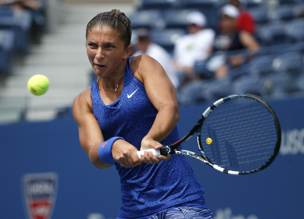 Sara Errani returns a shot to Mirjana Lucic-Baroni in the U.S. Open on Sunday in New York.